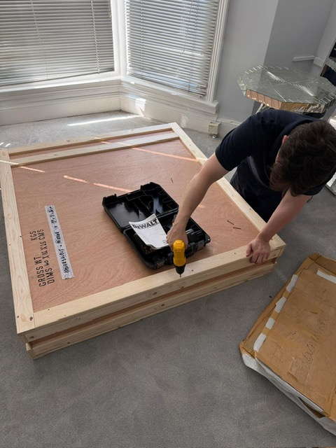 Moversaurus removal crew loading a West Sussex home